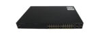 Przedni panel switcha Cisco z 24 portami RJ45 i czterema slotami SFP, obudowa w dobrym stanie.