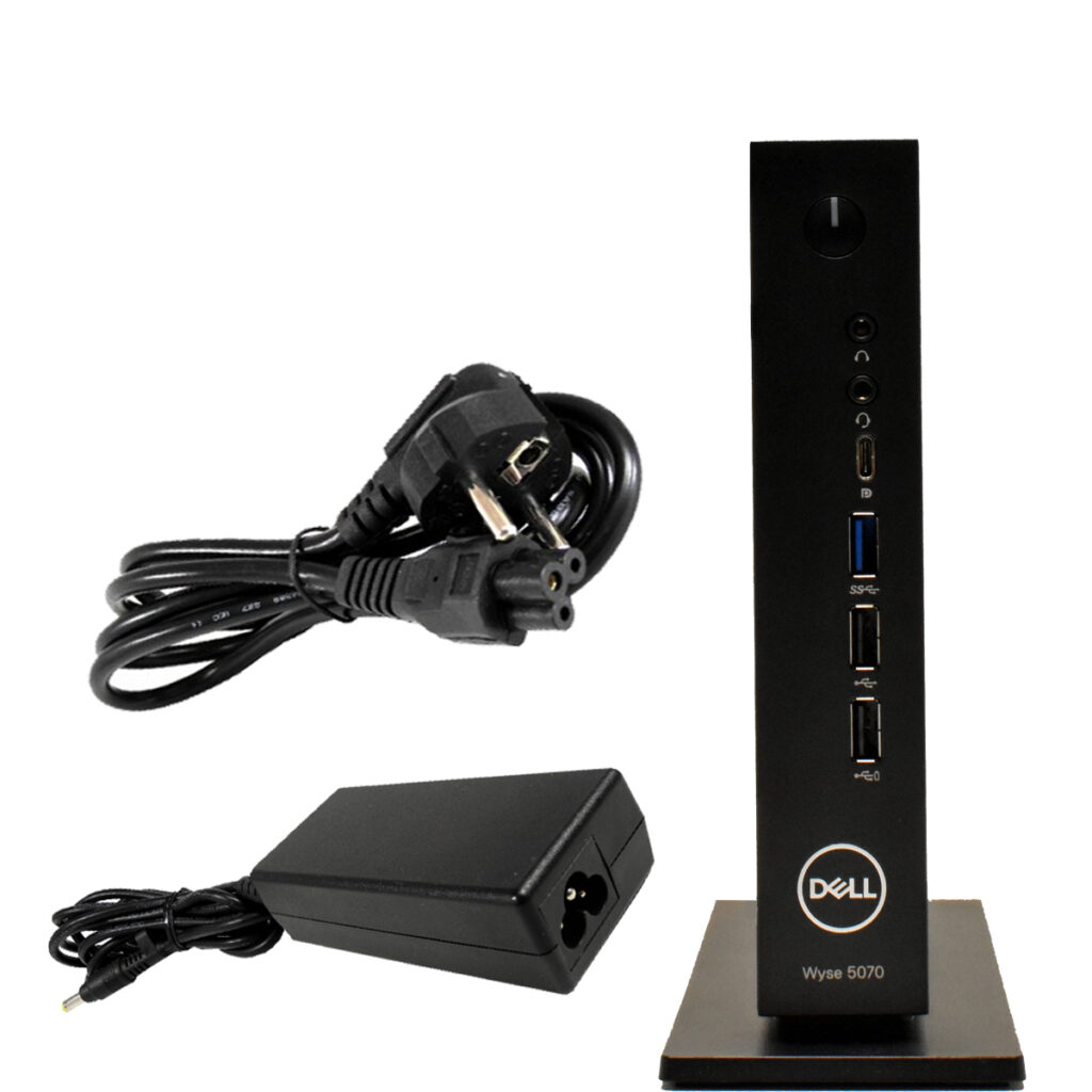 Thin client Dell Wyse 5070 na podstawce z portami USB, obok czarny zasilacz i kabel zasilający.