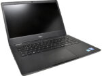 Otwarty laptop Dell z podświetlaną klawiaturą, widok pod kątem z przodu na ekran i touchpad.