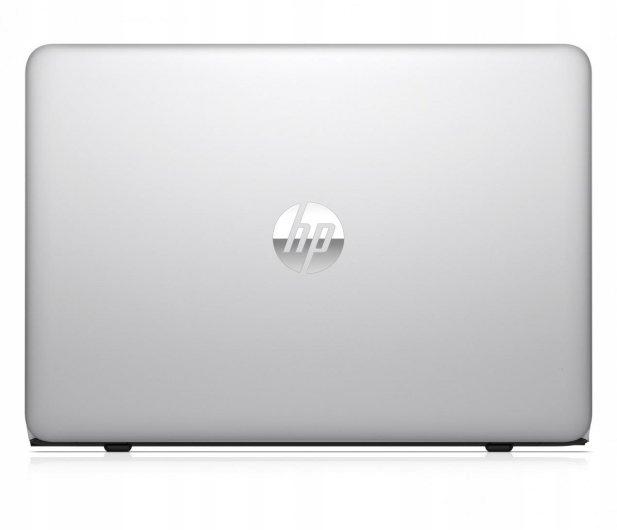Zamknięta klapa laptopa HP widziana od tyłu, srebrna obudowa z logo HP na środku.