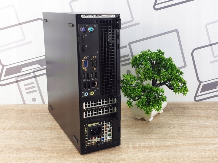 Tylny panel komputera Dell 9020 SFF z portami PS/2, szeregowym, wideo i USB, obudowa w dobrym stanie.