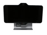 System wideokonferencyjny Polycom HDX 4500 z 24-calowym monitorem na metalowej podstawie, ekran wyłączony, kamera i pilot widoczne z przodu.