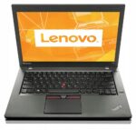 Laptop Lenovo ThinkPad T450 otwarty pod niewielkim kątem, na ekranie logo Lenovo, widoczna klawiatura i touchpad z czerwonym trackpointem.