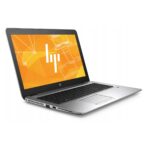Otwarty laptop HP EliteBook 850 G4 pod kątem z boku, ekran włączony z pomarańczową grafiką i logo HP.