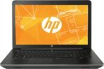 Laptop HP ZBook 17 otwarty od przodu, ekran wyświetla pomarańczowe logo HP na czarnym tle, widoczna klawiatura z touchpadem.