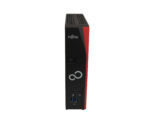 Thin client Fujitsu Futro S520 w pionowej pozycji, widok z przodu z portami audio i USB oraz logo Fujitsu na obudowie.
