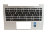 Górna obudowa laptopa HP z klawiaturą w układzie niemieckim QWERTZ, widoczny touchpad i naklejki Intel Core oraz Windows 11.