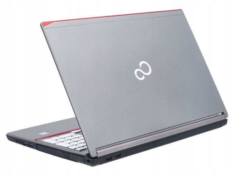 Otwarty laptop Fujitsu Lifebook widziany od tyłu pod kątem, z logo na klapie i widocznym fragmentem klawiatury.