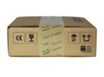 Zamknięte tekturowe pudełko z pieczęcią gwarancyjną Cisco Certified Refresh i symbolami certyfikatów na wieku.