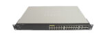 Przedni panel switcha Cisco z rzędem 24 portów RJ45 i uszami montażowymi po bokach obudowy.