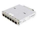 Moduł tML z sześcioma portami RJ45 w rzędzie na metalowej obudowie, widoczna naklejka z opisem na górze.
