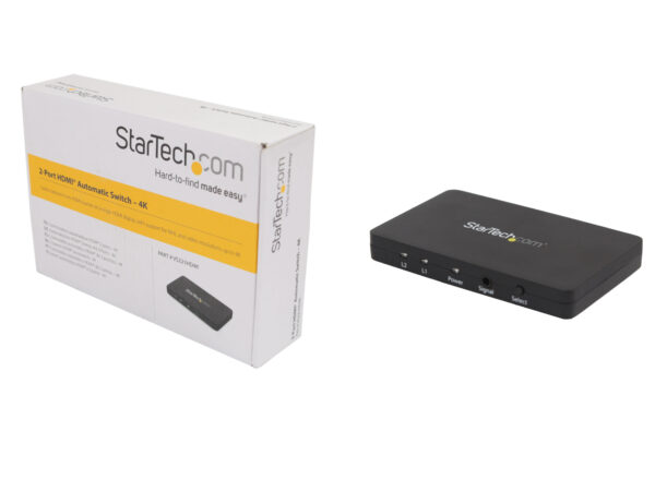 Pudełko StarTech obok czarnej obudowy przełącznika HDMI z przyciskami na górnej powierzchni.