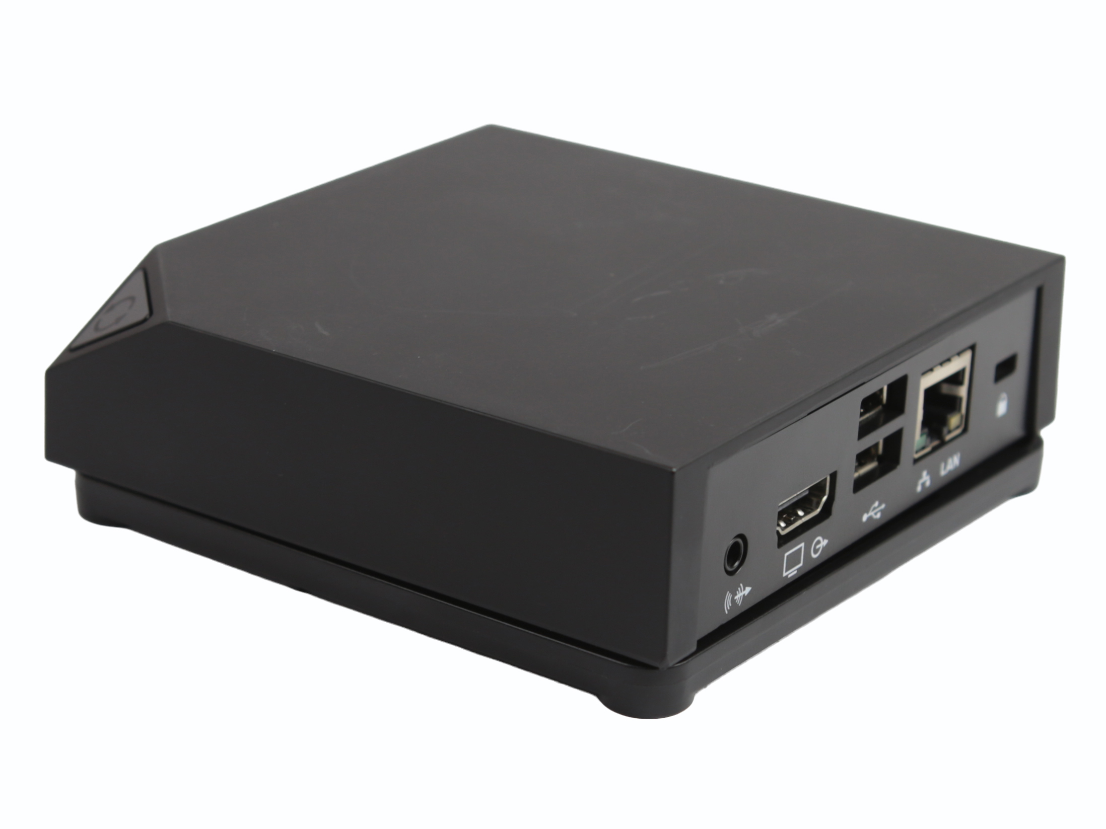 Tylny panel niewielkiej czarnej obudowy z portami HDMI, dwoma USB oraz gniazdem sieciowym RJ45.