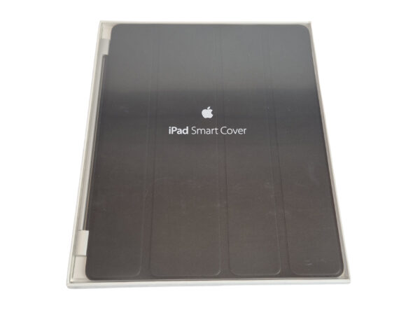 Etui iPad Smart Cover w oryginalnym pudełku z logo Apple, kolor czarny, widoczne przez przezroczystą pokrywę.