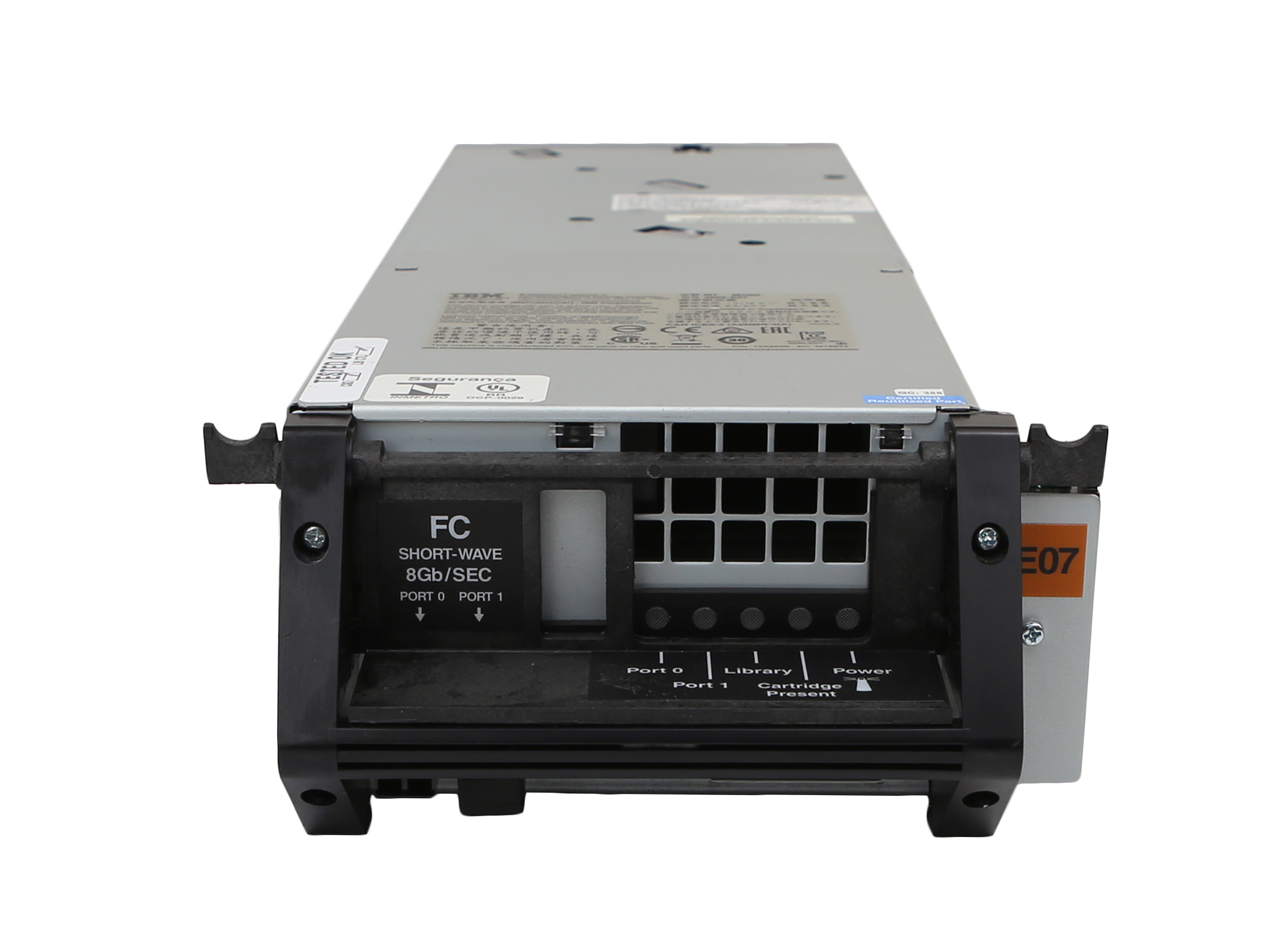 Moduł napędu taśmowego IBM 3592-E07 z przodu, widoczny panel FC i uchwyty do wysuwania z obudowy.