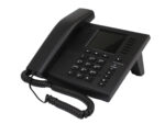 Telefon biurowy Innovaphone IP112a pod kątem z boku, widoczna słuchawka na widełkach, klawiatura numeryczna i wyświetlacz.