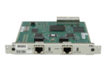 Moduł Juniper PIM z dwoma portami RJ48 i diodami statusu, widoczna płytka elektroniczna z układami scalonymi.