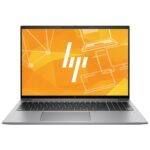 Laptop HP ZBook Firefly otwarty pod niewielkim kątem, ekran z pomarańczową grafiką, widoczna klawiatura i touchpad.