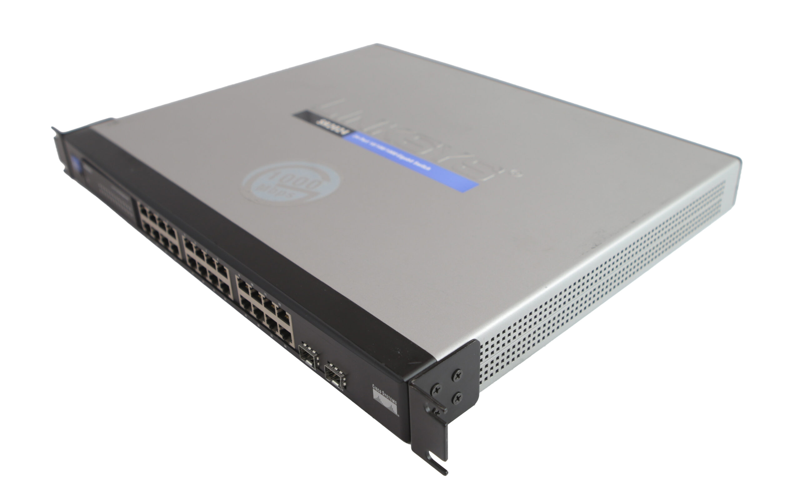 Switch Cisco Linksys widziany z przodu-góry, widoczny rząd portów RJ45 i uszy montażowe do szafy rack