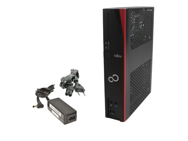Komputer Fujitsu Futro S940n ustawiony pionowo obok zewnętrznego zasilacza z odłączonym kablem zasilającym.